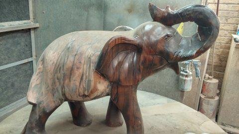 Ebony_Elephant_refinished_before_and_after_2